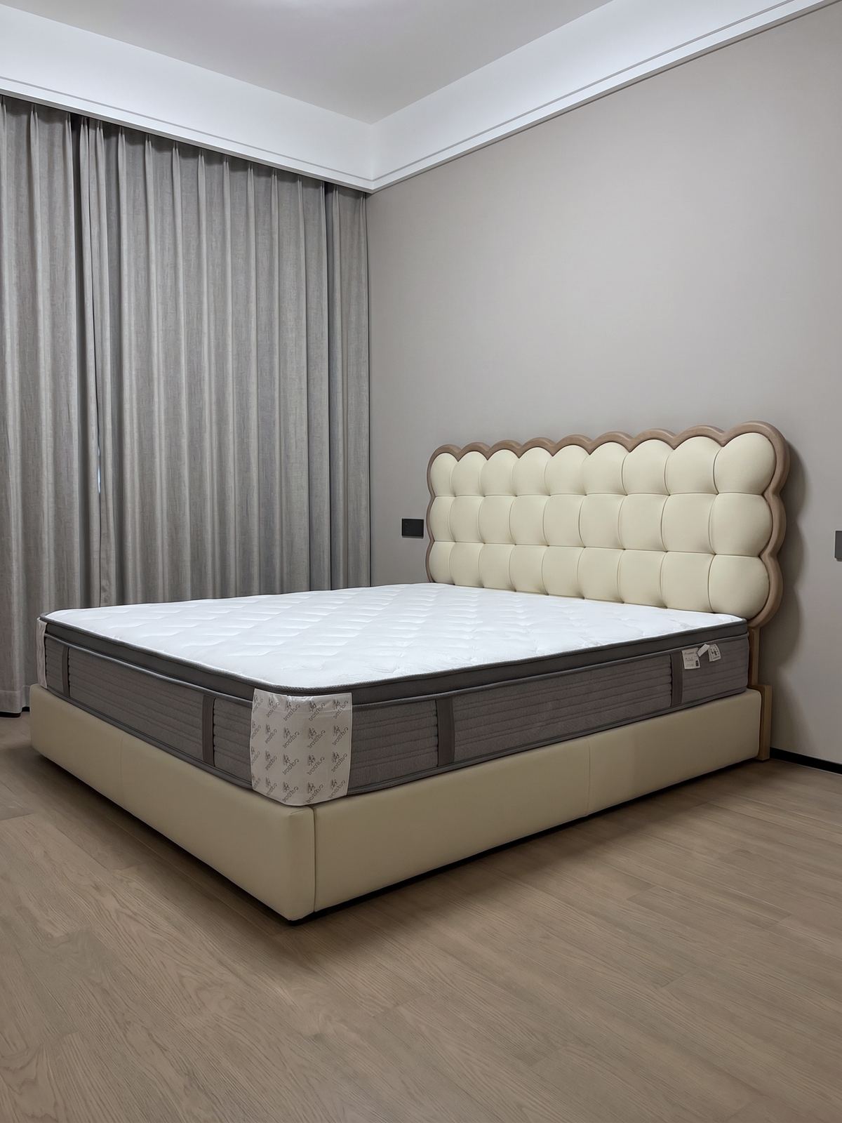 Bedroom with leather-trimmed bed frame